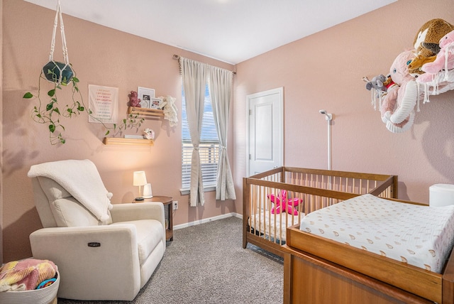 carpeted bedroom featuring baseboards