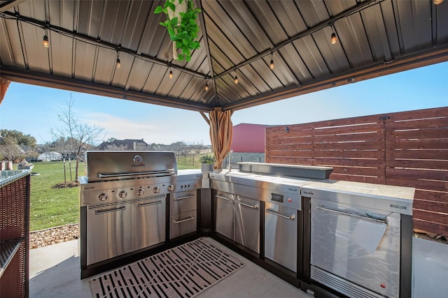 1016 Northern Oaks Ct, Springtown, TX 76082 - view of patio / terrace featuring an outdoor kitchen and a gazebo