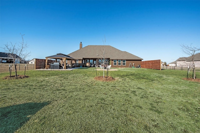 1016 Northern Oaks Ct, Springtown, TX 76082 - rear view of property with a gazebo and a chimney