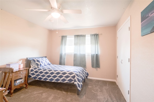 bedroom featuring carpet flooring, ceiling fan, and baseboards