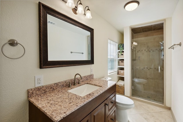 full bath featuring tile patterned flooring, toilet, visible vents, vanity, and a shower stall