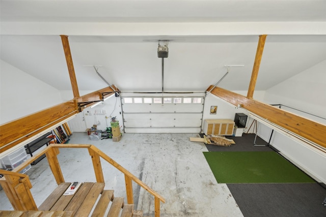 garage featuring a garage door opener