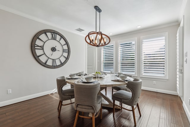 dining space with baseboards, a notable chandelier, dark wood finished floors, and crown molding