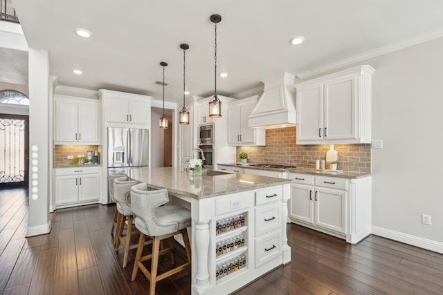 kitchen featuring custom exhaust hood, white cabinets, dark wood-style flooring, and stainless steel appliances