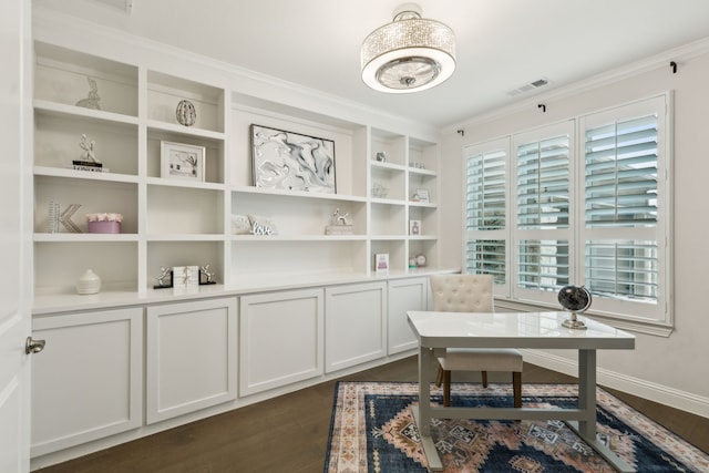 office featuring dark wood-style flooring, visible vents, and baseboards