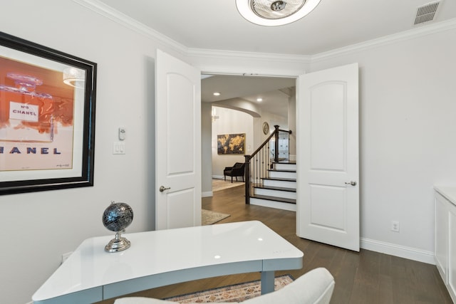 office featuring baseboards, dark wood finished floors, visible vents, and crown molding