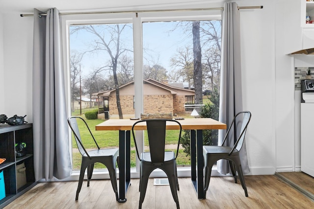 dining area featuring wood finished floors