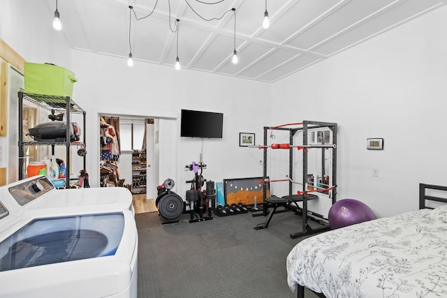 exercise area featuring separate washer and dryer