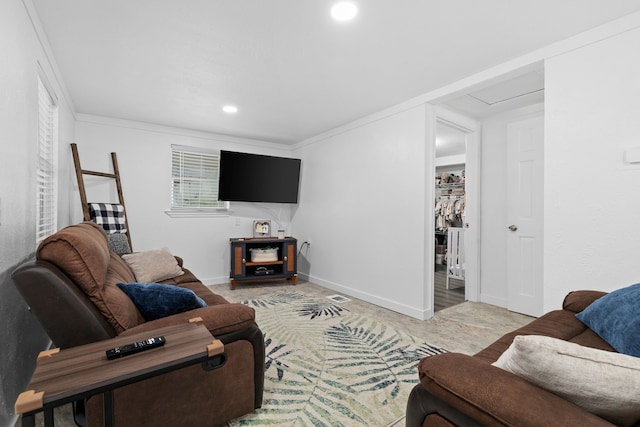 living area with recessed lighting and baseboards