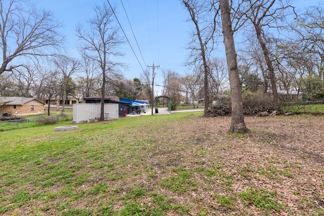 view of yard with fence