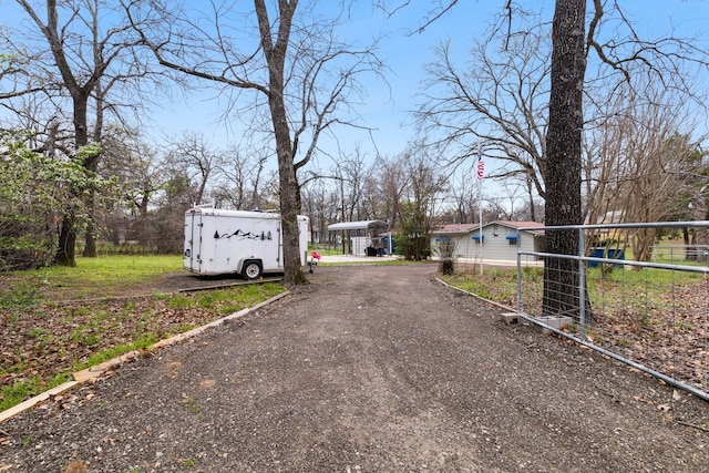 view of street featuring driveway