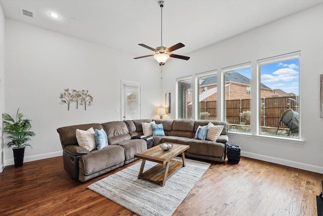 living room with ceiling fan, recessed lighting, wood finished floors, visible vents, and baseboards