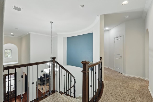 hall featuring crown molding, recessed lighting, visible vents, an upstairs landing, and baseboards