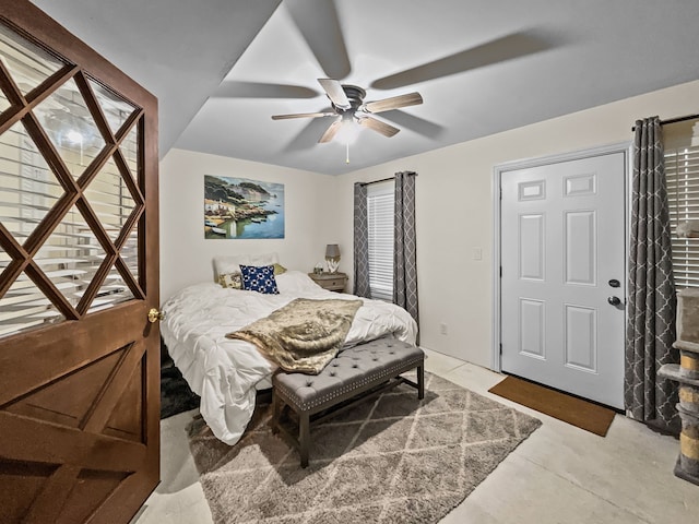 bedroom featuring concrete floors and ceiling fan