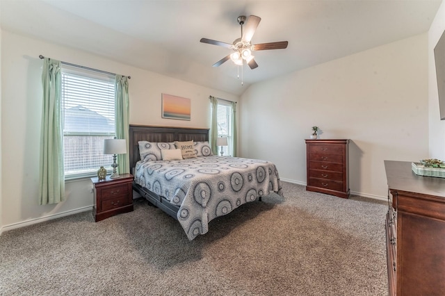 carpeted bedroom with lofted ceiling, ceiling fan, and baseboards