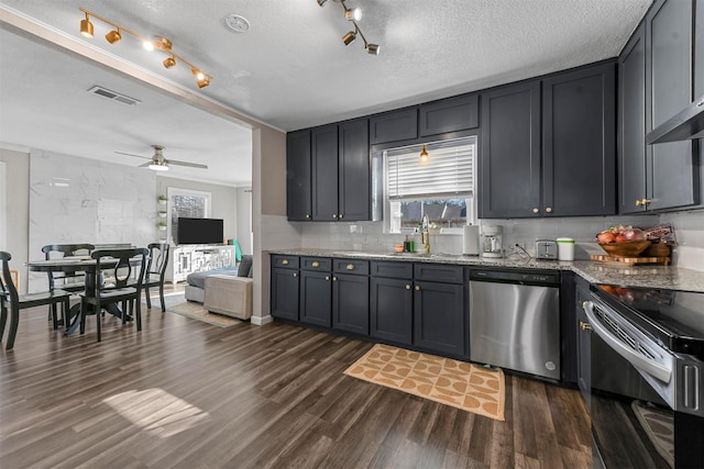 kitchen featuring dark wood-style flooring, a sink, visible vents, stainless steel dishwasher, and electric range oven