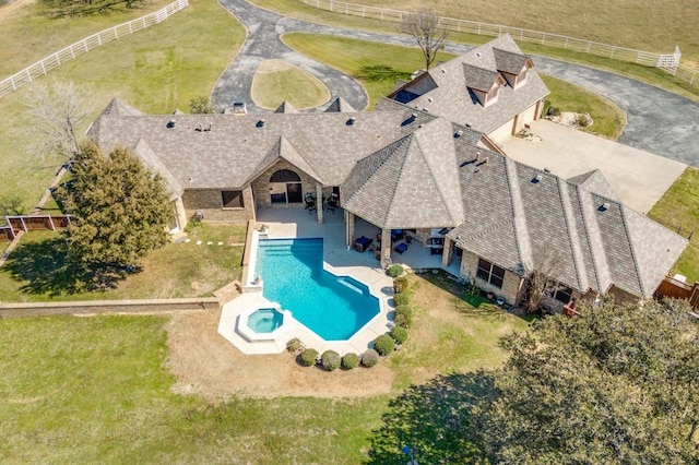 view of pool featuring a patio and fence