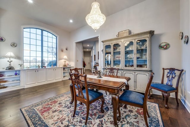 dining area with recessed lighting, baseboards, a notable chandelier, and dark wood-style flooring