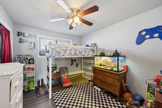 bedroom featuring ceiling fan and wood finished floors