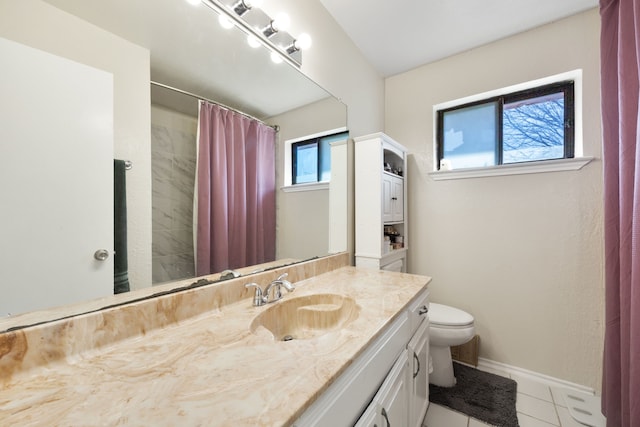 full bath with toilet, vanity, a shower with curtain, baseboards, and tile patterned floors