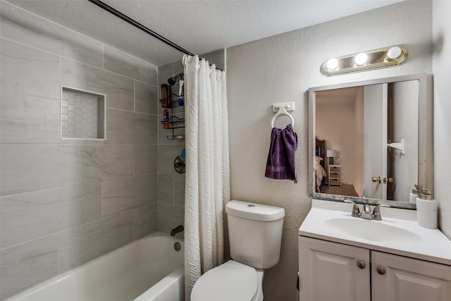 full bath featuring a textured wall, toilet, vanity, shower / bath combination with curtain, and a textured ceiling