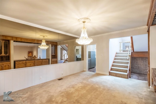 interior space featuring carpet, visible vents, stairway, and a notable chandelier