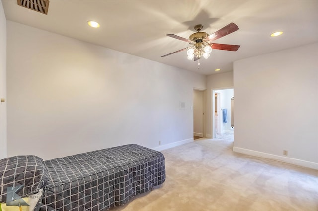 bedroom with light carpet, recessed lighting, visible vents, and baseboards