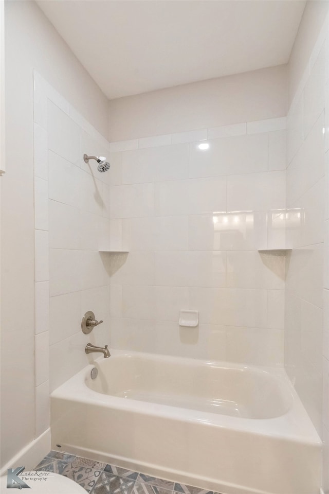 full bath featuring tub / shower combination