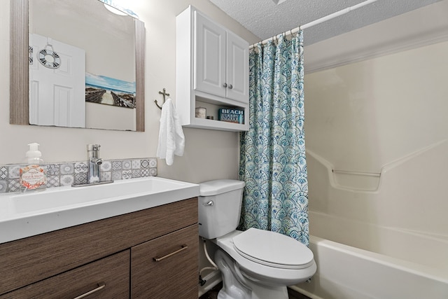 bathroom featuring shower / tub combo, a textured ceiling, toilet, and vanity