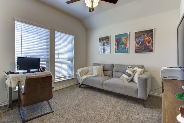 office area with lofted ceiling, carpet flooring, ceiling fan, and baseboards