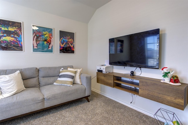 carpeted living room featuring lofted ceiling and baseboards