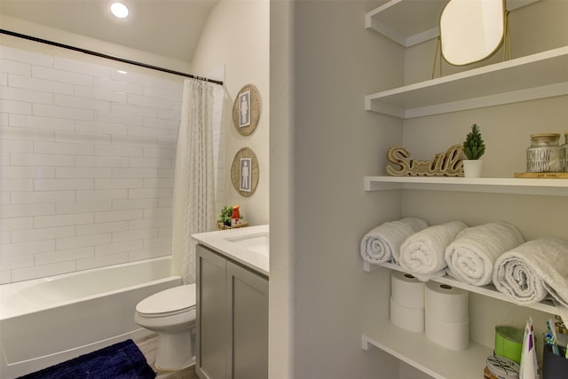 bathroom featuring recessed lighting, shower / tub combo with curtain, vanity, and toilet