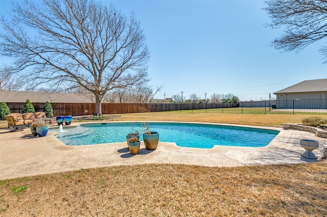 view of pool featuring a lawn, a patio, a fenced backyard, and a fenced in pool