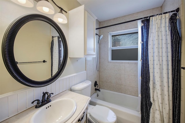109 Belden Cir, Mckinney, TX 75069 - bathroom featuring shower / tub combo, toilet, vanity, and wainscoting