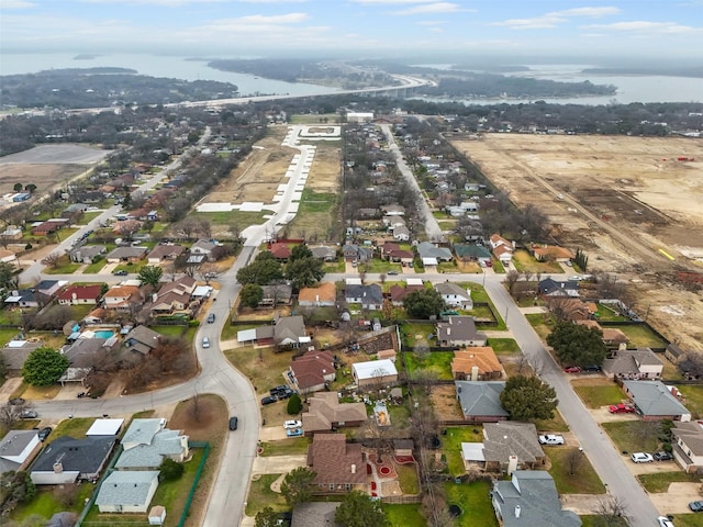 birds eye view of property with a residential view