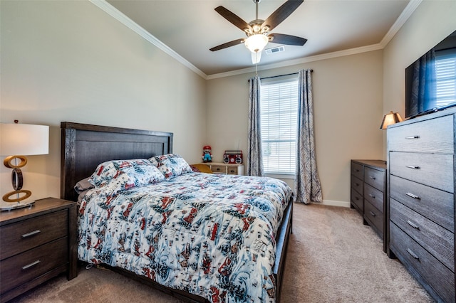 bedroom with visible vents, light carpet, baseboards, and crown molding