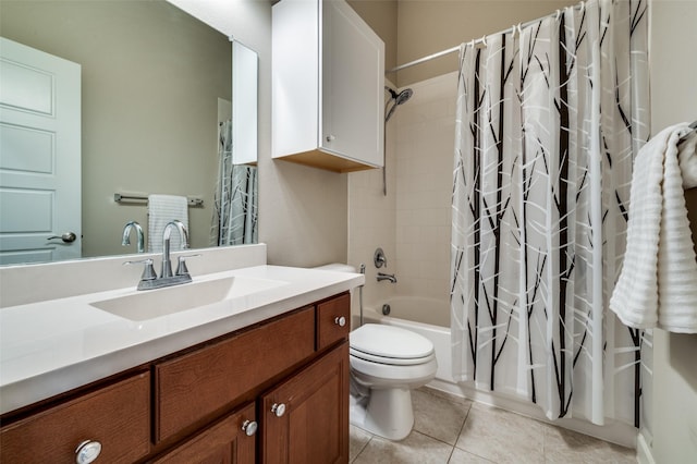 bathroom with tile patterned flooring, toilet, shower / bath combo with shower curtain, and vanity