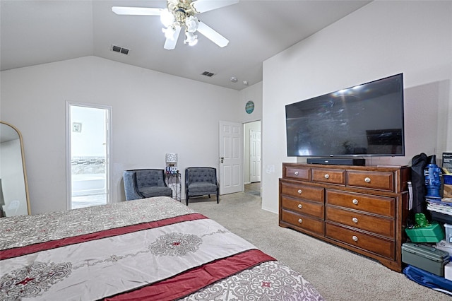 carpeted bedroom with lofted ceiling, visible vents, and a ceiling fan