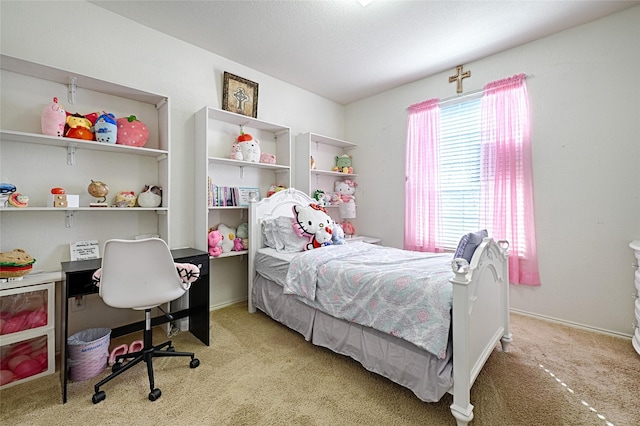 bedroom with light colored carpet