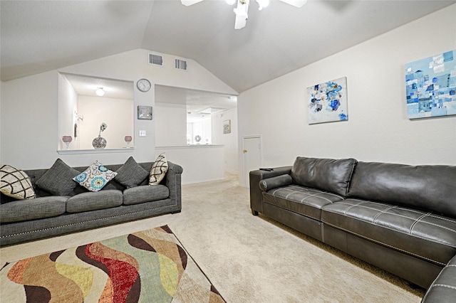 carpeted living area featuring lofted ceiling, ceiling fan, and visible vents