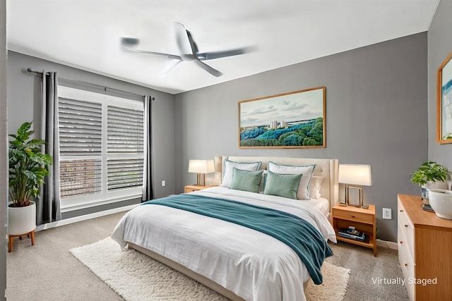 bedroom with carpet flooring and a ceiling fan