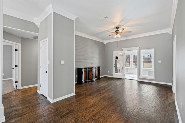 unfurnished living room featuring baseboards, visible vents, dark wood-type flooring, and ornamental molding