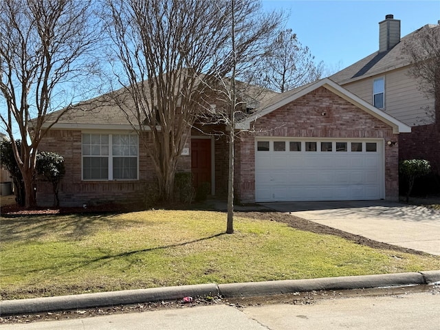 view of front of house featuring an attached garage, concrete driveway, brick siding, and a front yard