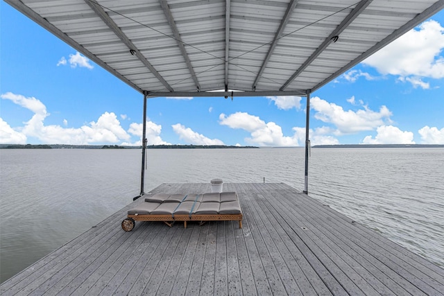 dock area with a water view