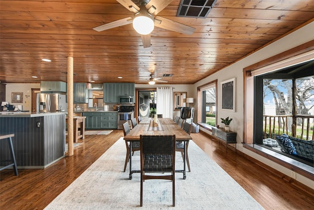 dining space with recessed lighting, wooden ceiling, visible vents, and wood finished floors