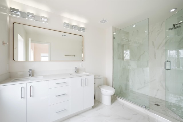 full bath with a marble finish shower, visible vents, marble finish floor, and a sink