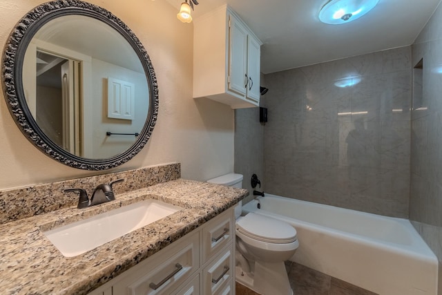 bathroom with tile patterned floors, vanity, toilet, and shower / bathtub combination