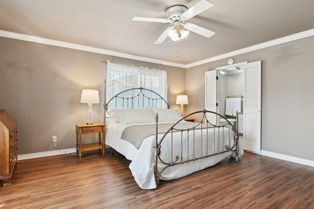 bedroom with a ceiling fan, crown molding, baseboards, and wood finished floors