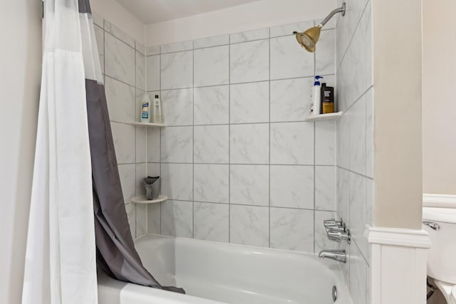 full bath featuring shower / bath combo and toilet