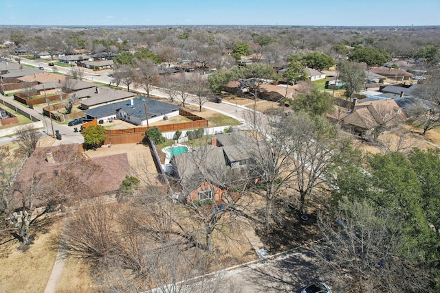 birds eye view of property with a residential view